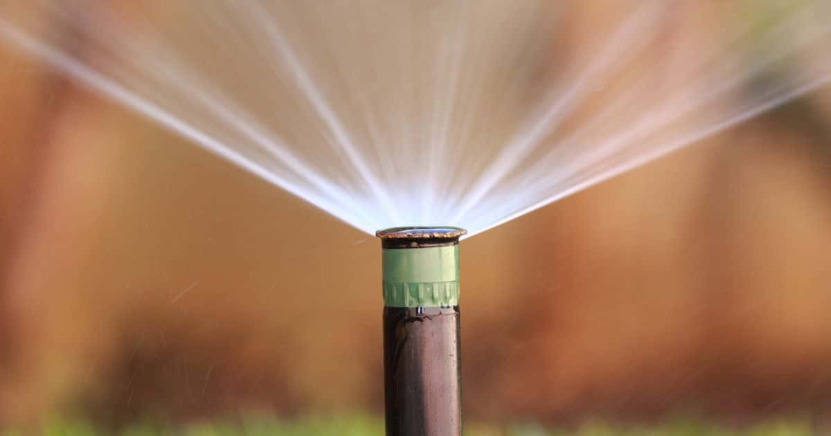 how to fix a sprinkler head that won't rotate